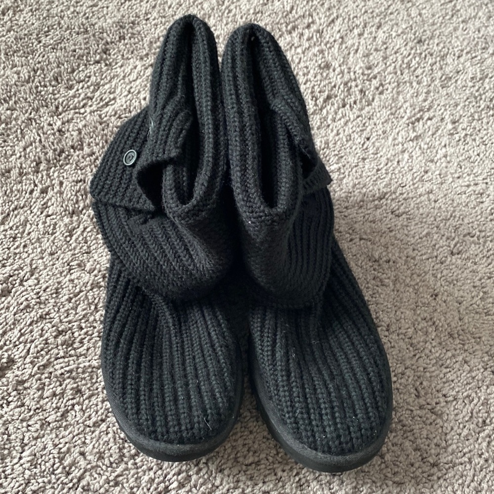 Black Woman’s UGG boots. Size 10, can be worn folded down, or pulled up.